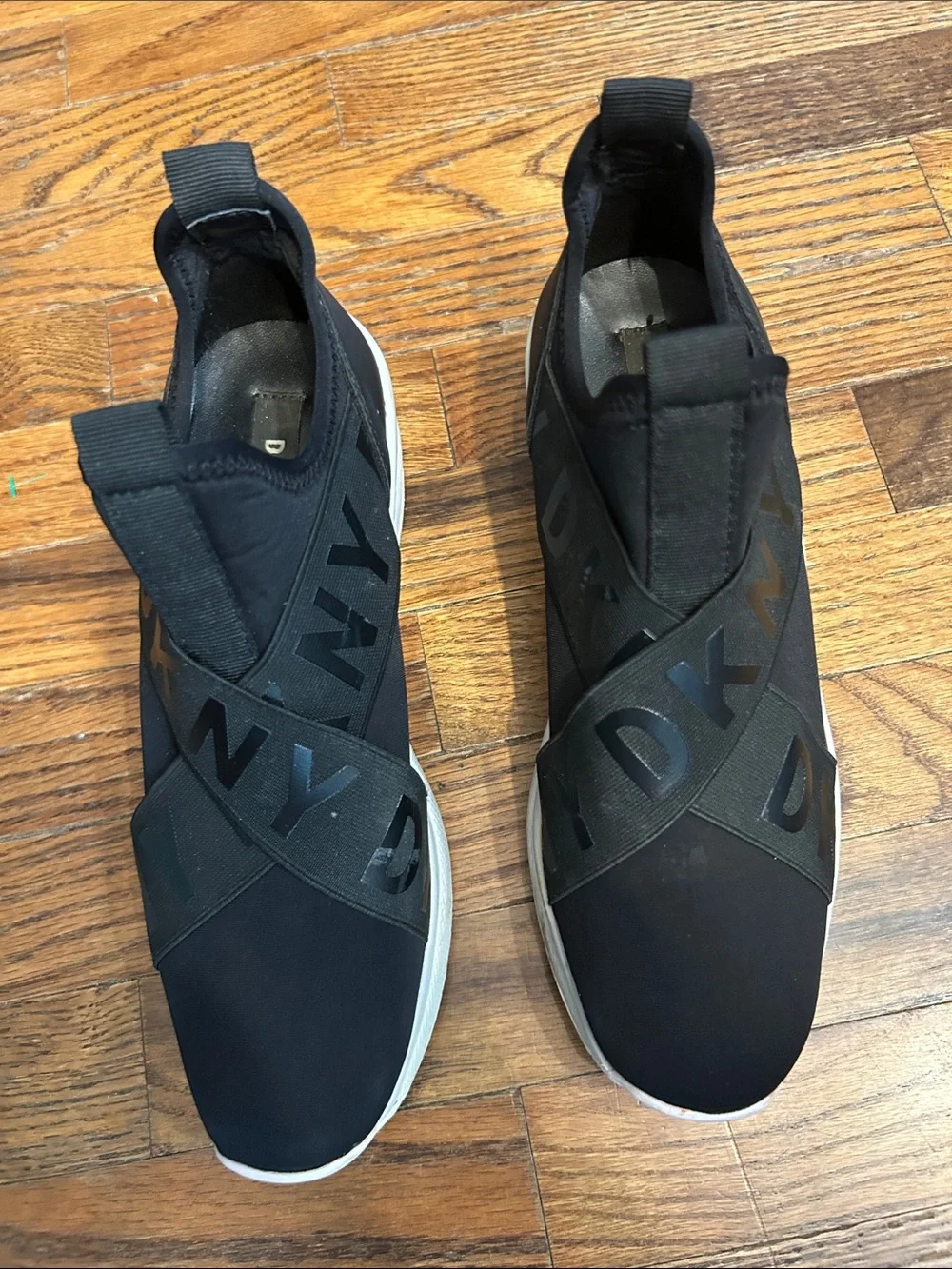 DKNY Black Slip-On Logo-Trim Women’s Sneakers with White Sole